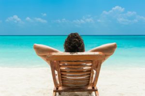 Man resting on beach